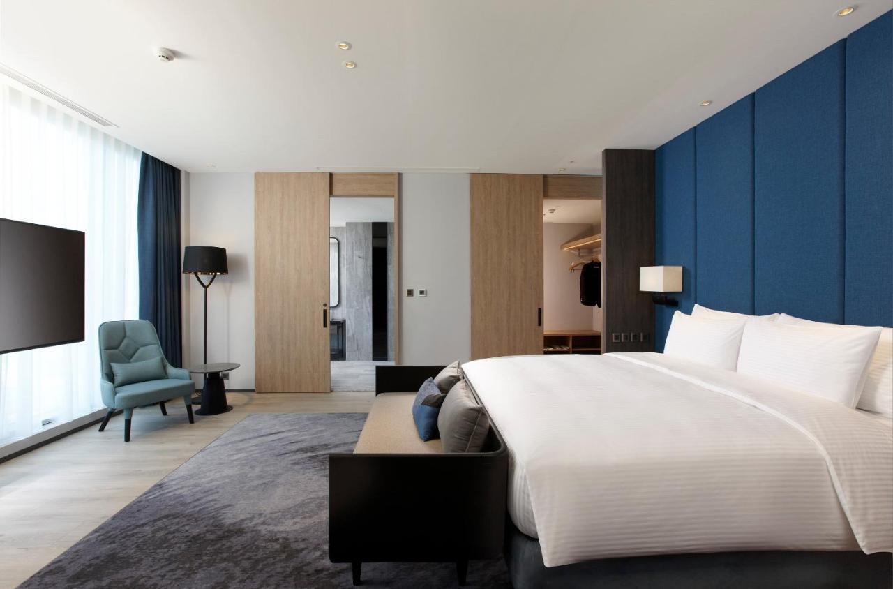 ホテル Cozzi ブルー 中レキ市 エクステリア 写真 A bedroom at the hotel